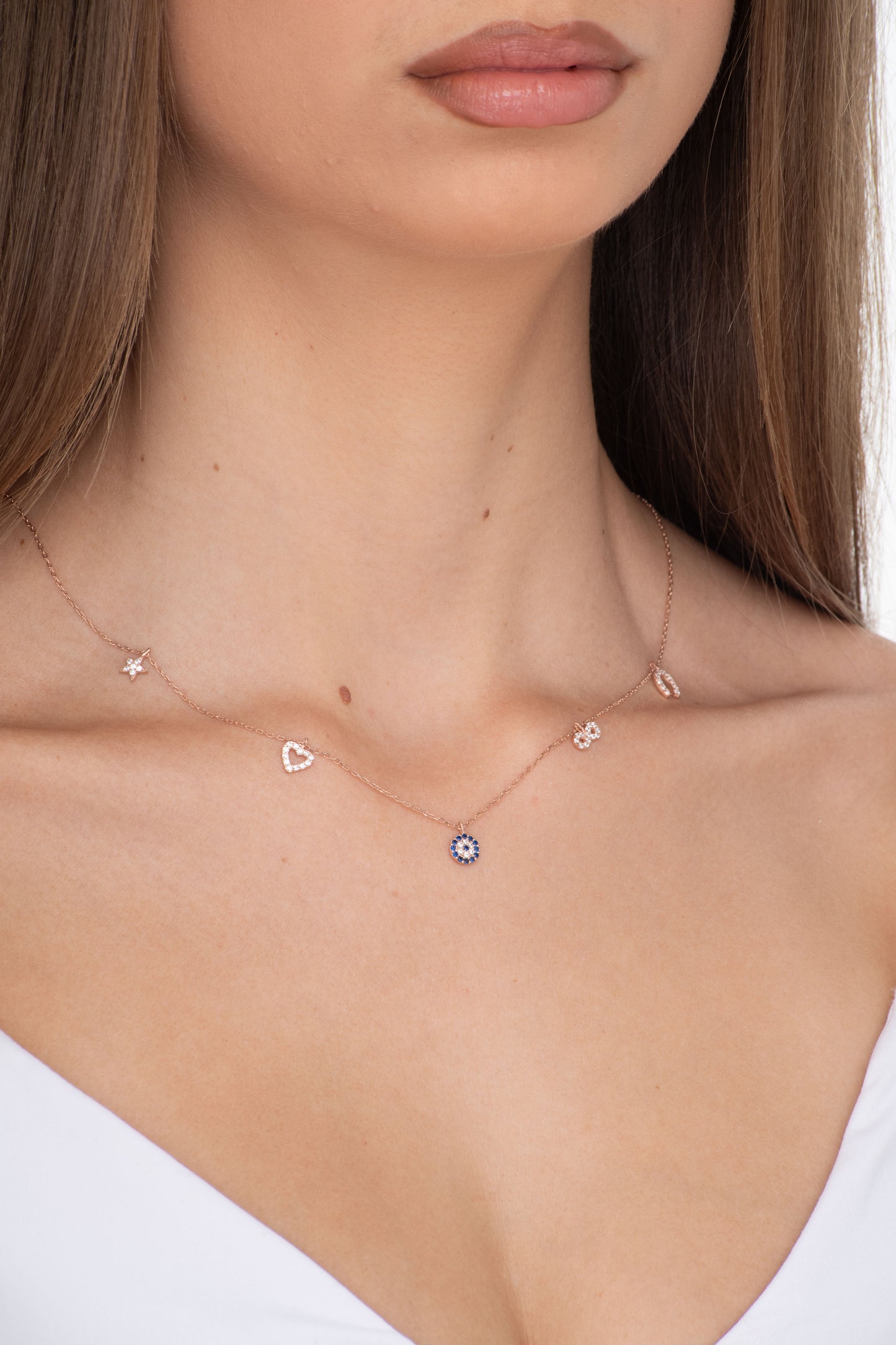 good luck rose gold necklace, rose gold charm necklace, evil eye necklace, infinity symbol necklace, horse shoe necklace