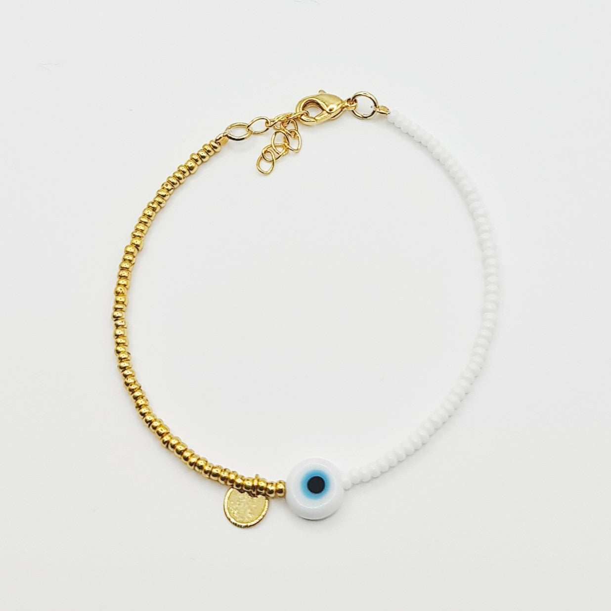 beaded bracelet, white and gold bead bracelet, evil eye bracelet, evil eye charm bracelet, white evil eye bracelet, gold beaded bracelet, white and gold beaded bracelet, beaded jewellery