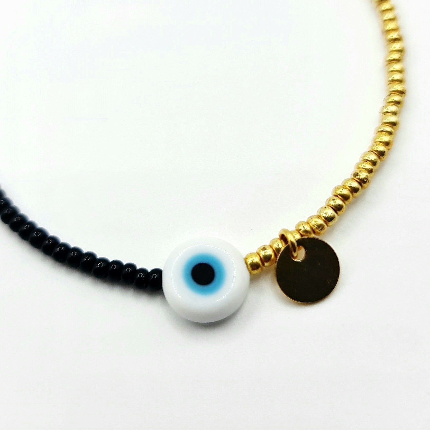 beaded bracelet, black and gold bead bracelet, evil eye bracelet, evil eye charm bracelet, black evil eye bracelet, black beaded bracelet, black and gold beaded bracelet, beaded jewellery