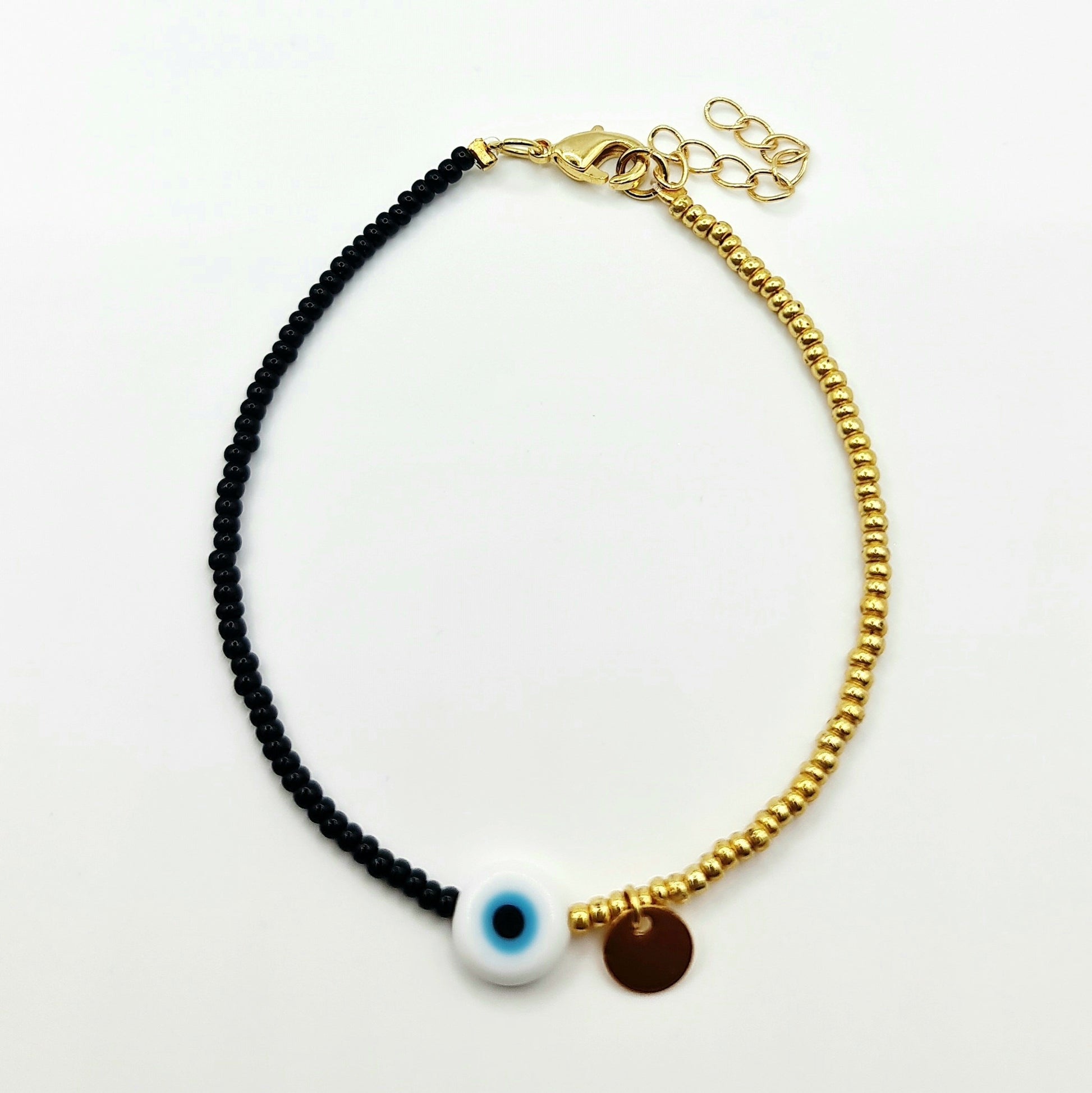 beaded bracelet, black and gold bead bracelet, evil eye bracelet, evil eye charm bracelet, black evil eye bracelet, black beaded bracelet, black and gold beaded bracelet, beaded jewellery