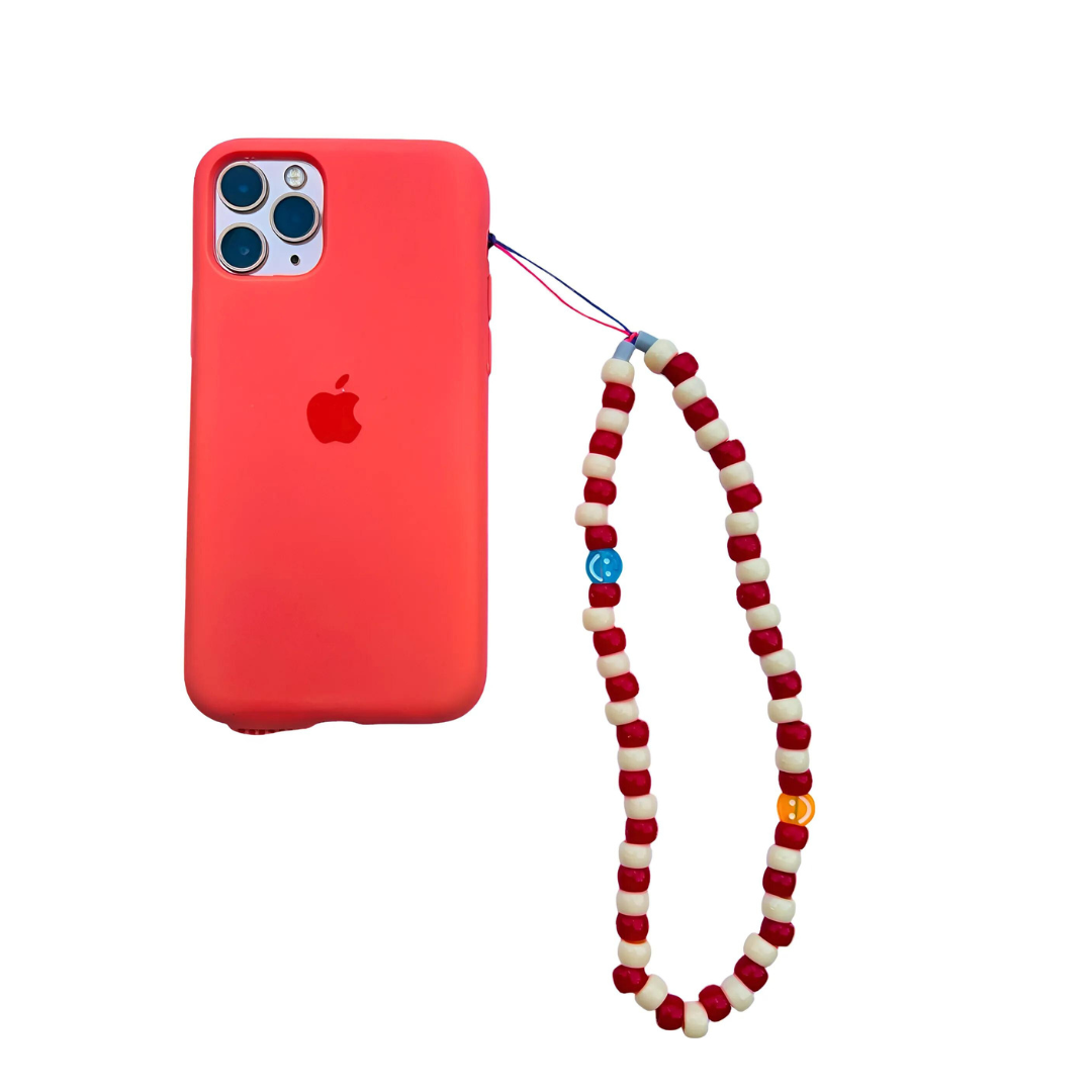 Colorful beaded phone charm, boho tassel, handmade accessory. Arcobaleno Beads phone strap, stylish phone accessory, unique design. Buy now, phone charm, add personality