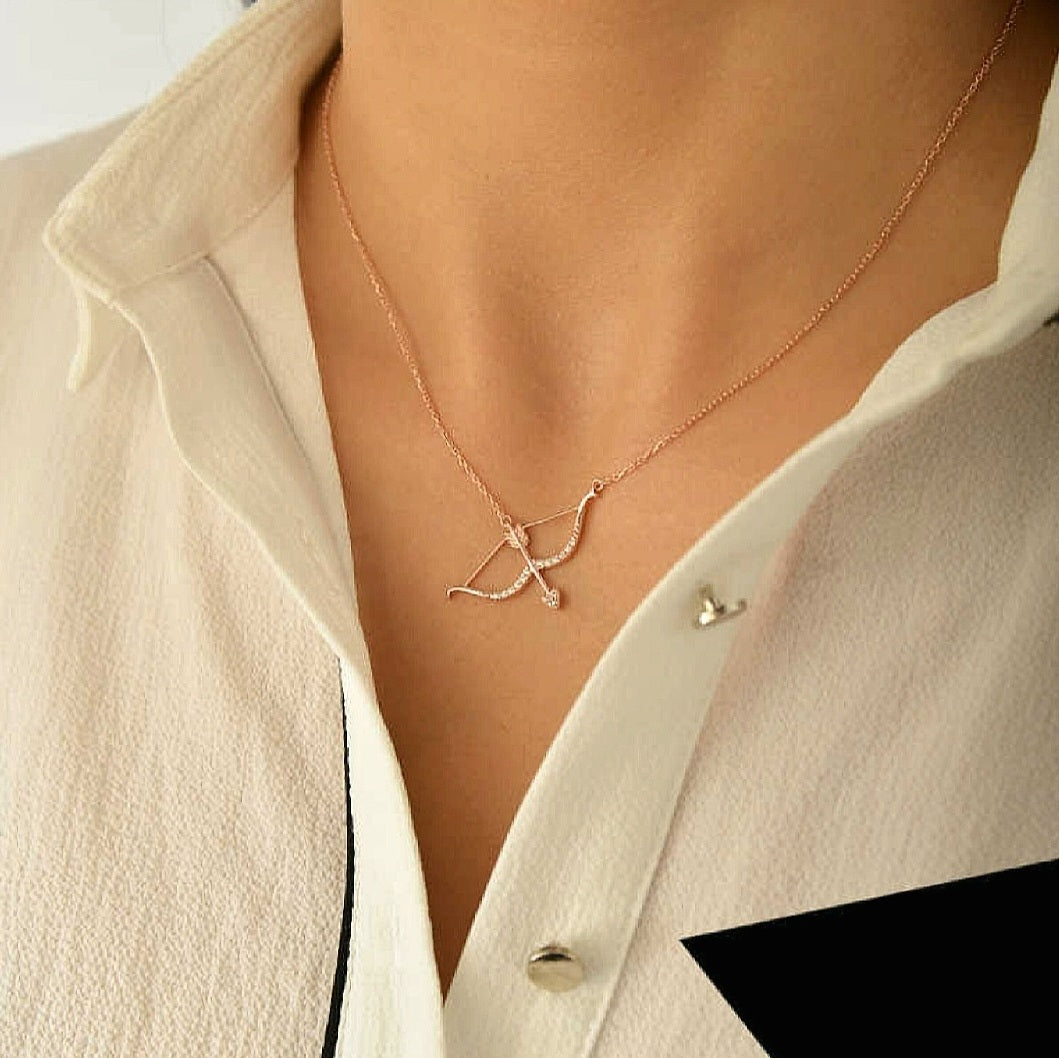 rose gold bow and arrow necklace, rose gold love necklace, rose gold cherub target necklace, rose gold diamond bow and arrow necklace