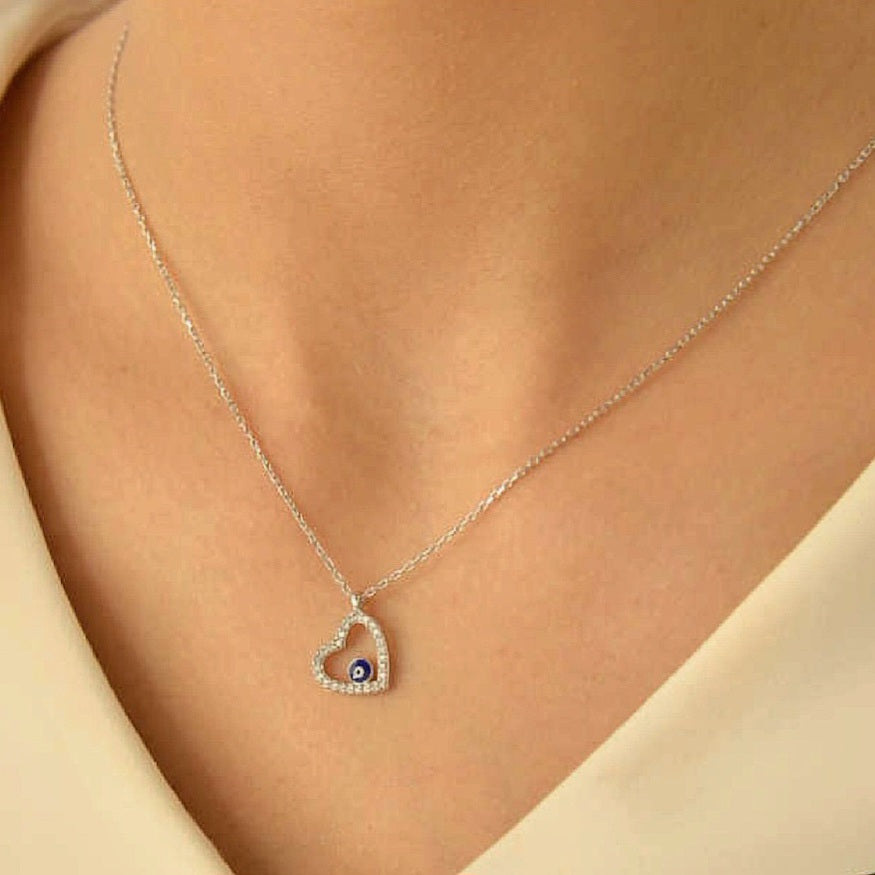 women wearing fashion Evil Eye Heart Necklace - Necklace, front/ side veiw