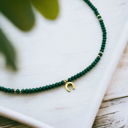 green crystal necklace, crystal bead necklace, gold horseshoe charm necklace, emerald green bead necklace, gold horseshoe necklace