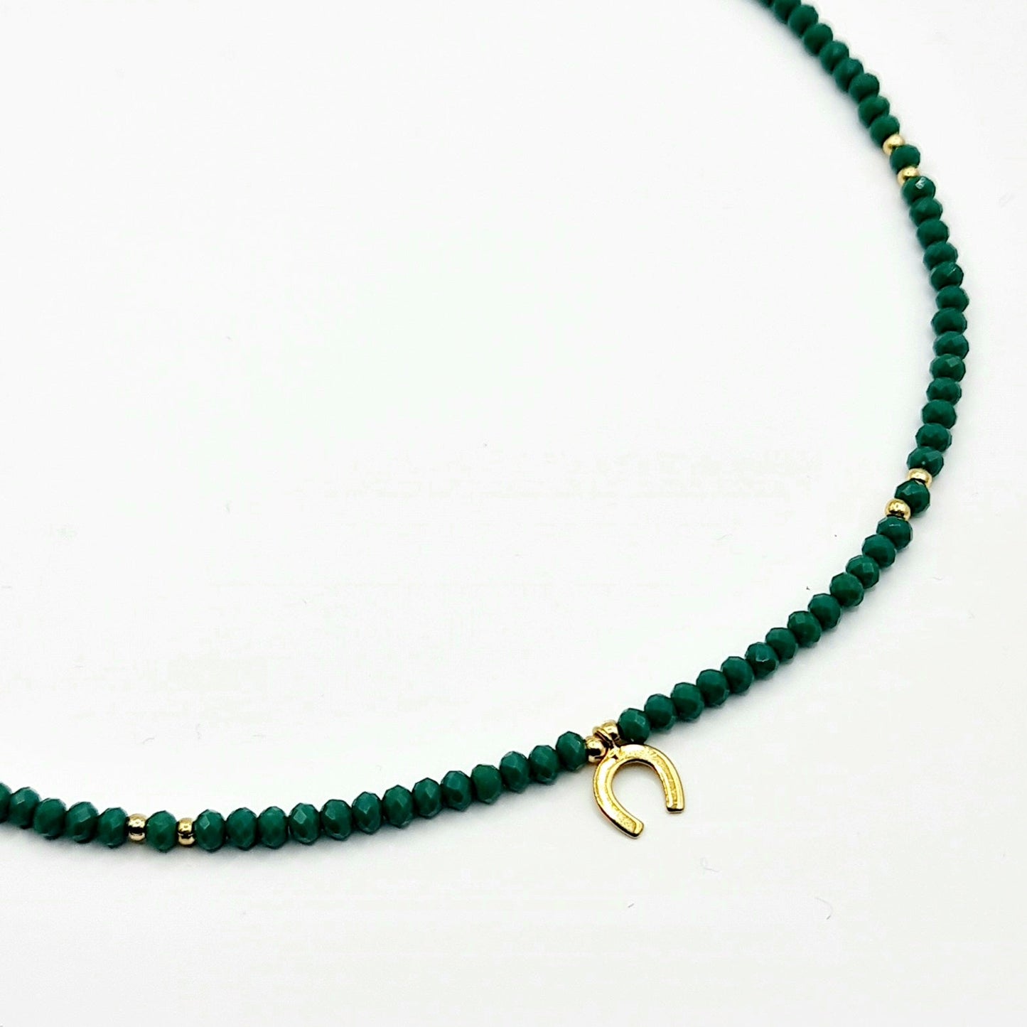 green crystal necklace, crystal bead necklace, gold horseshoe charm necklace, emerald green bead necklace, gold horseshoe necklace