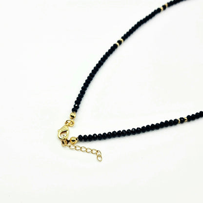 black crystal necklace, crystal bead necklace, gold horseshoe charm necklace, black bead necklace, gold horseshoe necklace